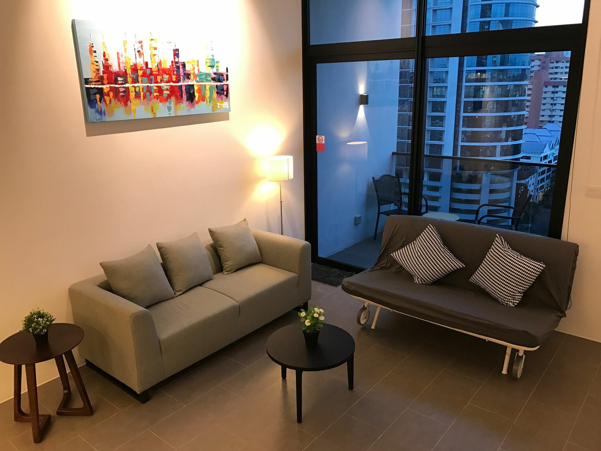 Hotel Alila Bangsar Kuala Lumpur Esterno foto A living room with a sofa bed